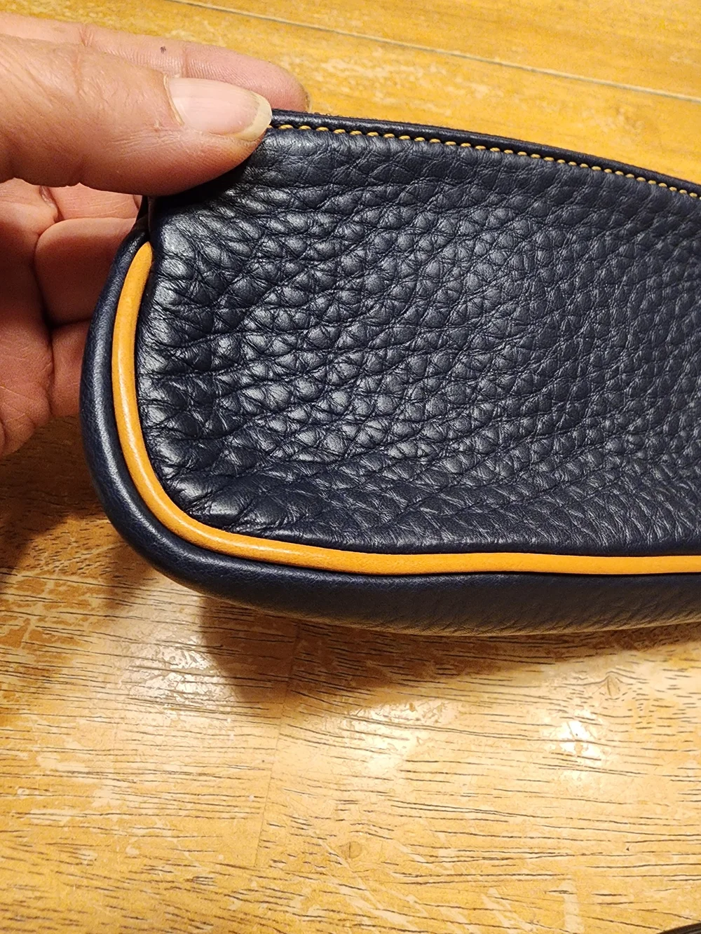 Dooney & Bourke Pebble Grain Slim Cosmetic slim pouch in navy blue Leather